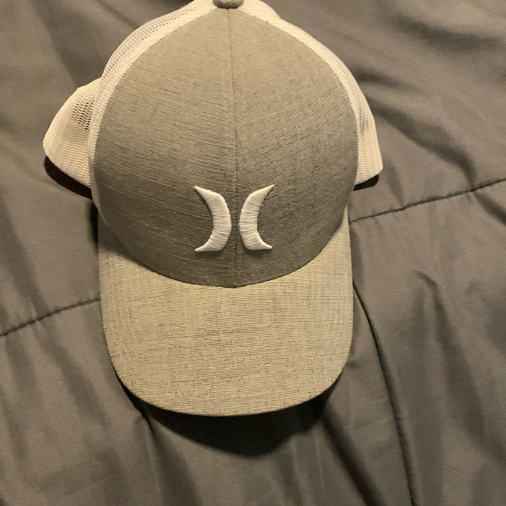 The hat is gray and white